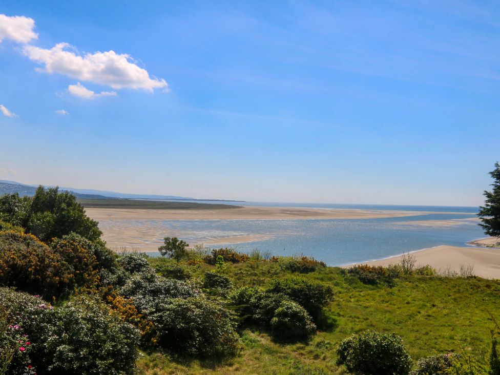 A view of the landscape with sand and water at Bryn Y Mor, Borth Y Gest