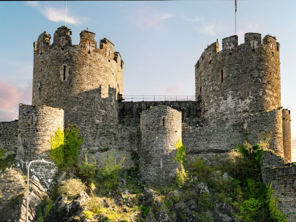 A castle with towers and stone walls in Conwy