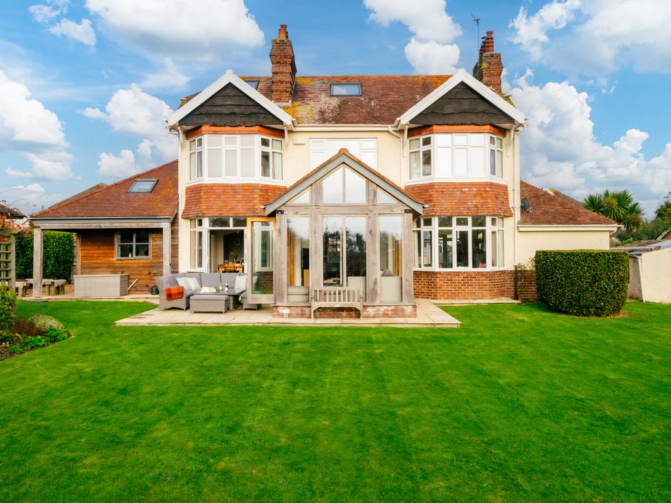 A house with a garden and patio at Summerfield in Deganwy