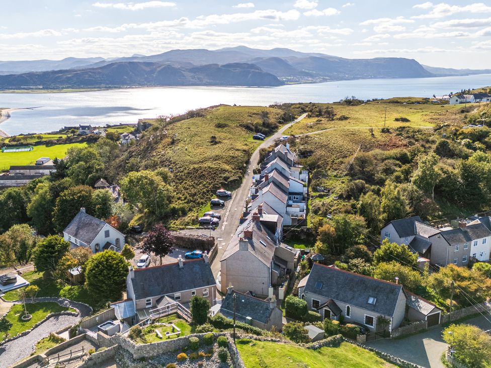 A panoramic view of a residential area overlooking a river at Ty Bach, Great Orme Llandudno