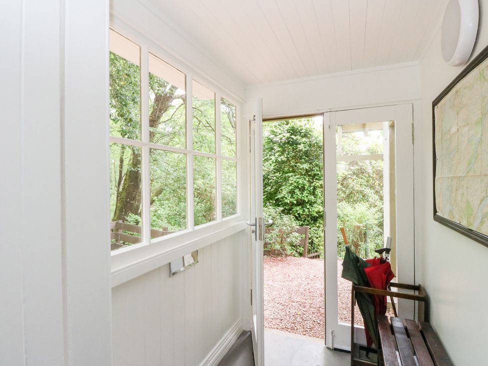An entryway with a door and windows at Tower Lodge, Lochawe