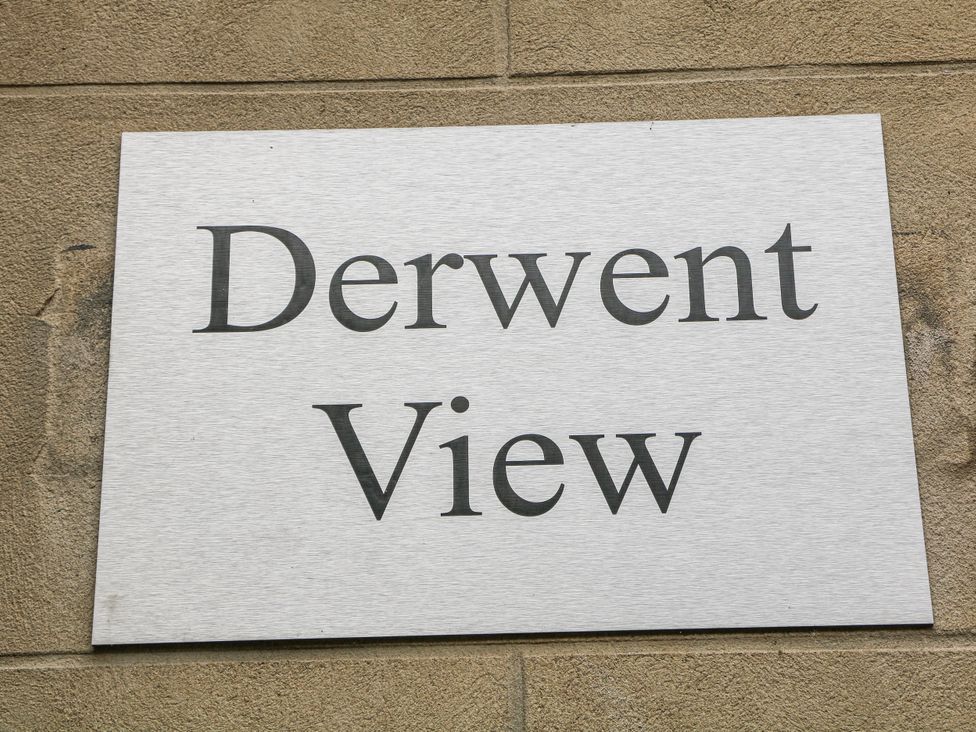 A sign displaying 'Derwent View' on a wall