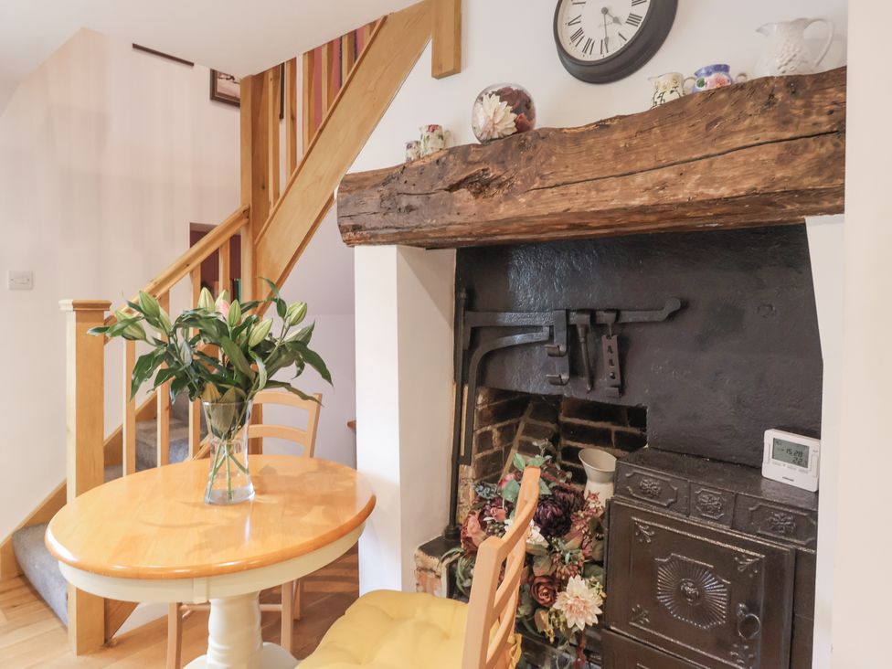 A dining room with a table and chairs at The Farmhouse Kitchen in Ripon