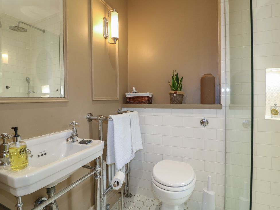 A bathroom with a sink and a toilet at Ivet Lowe in Hopton near Wirksworth