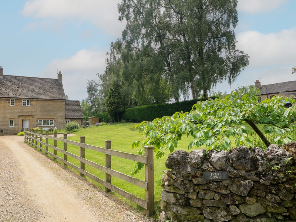 A house with a garden and fence at Ivet Lowe in Hopton near Wirksworth