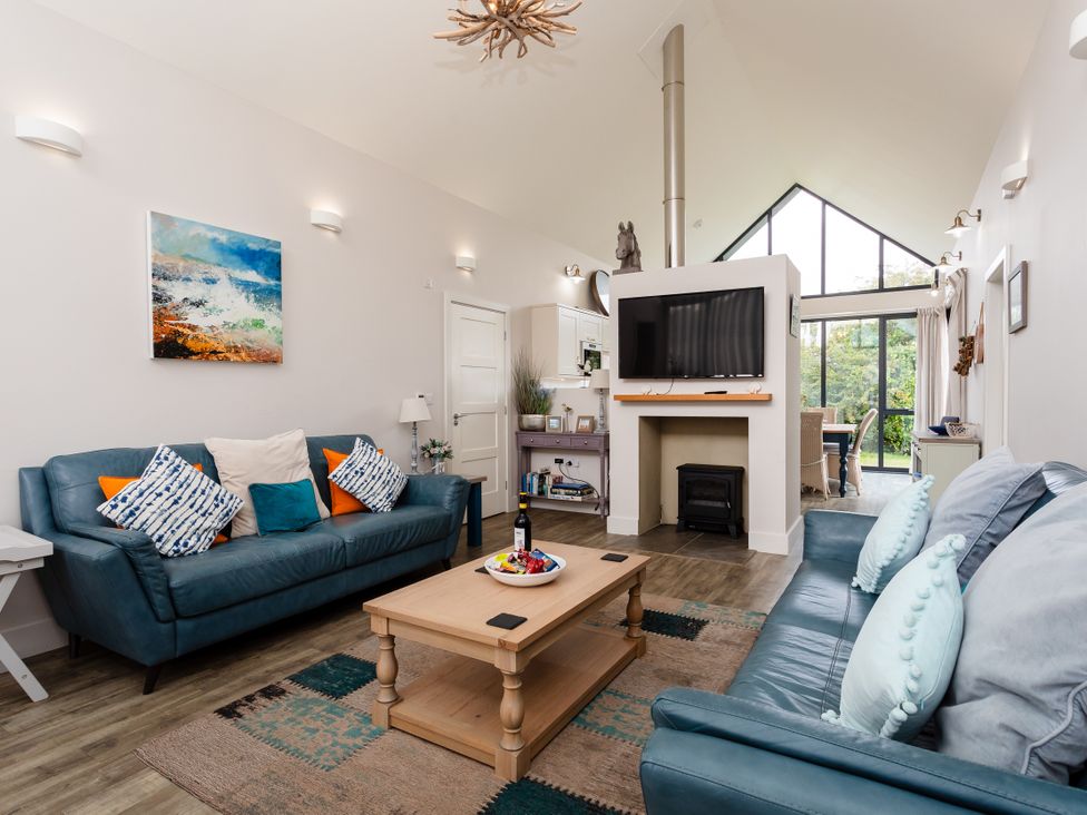 A living room with sofas and a coffee table at Betony in Bamburgh