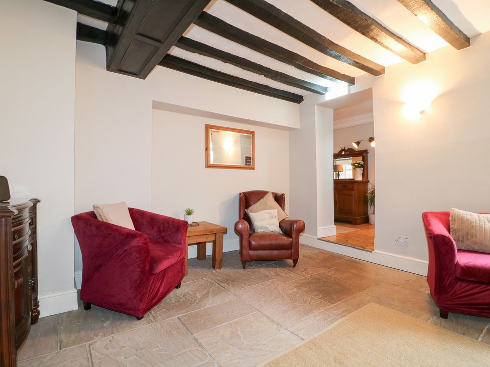 A snug with two chairs and a coffee table at Hambleton House in Castle Donington