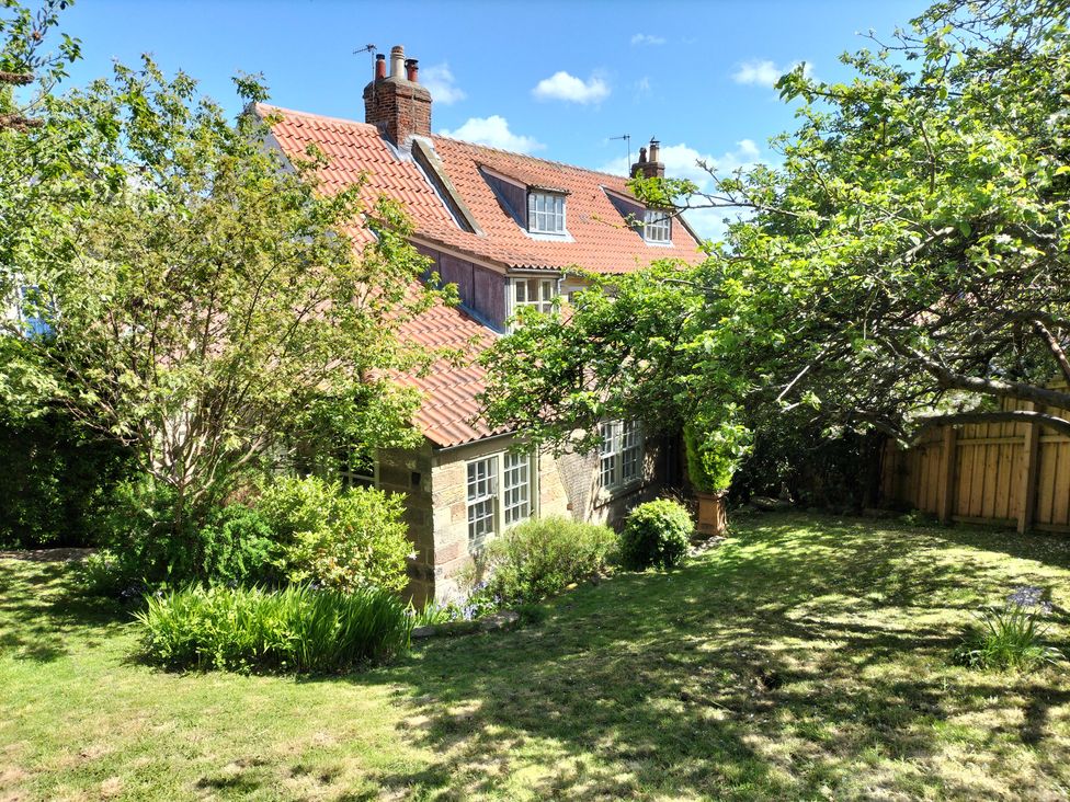 A house with garden and trees at Damson Cottage in Whitby