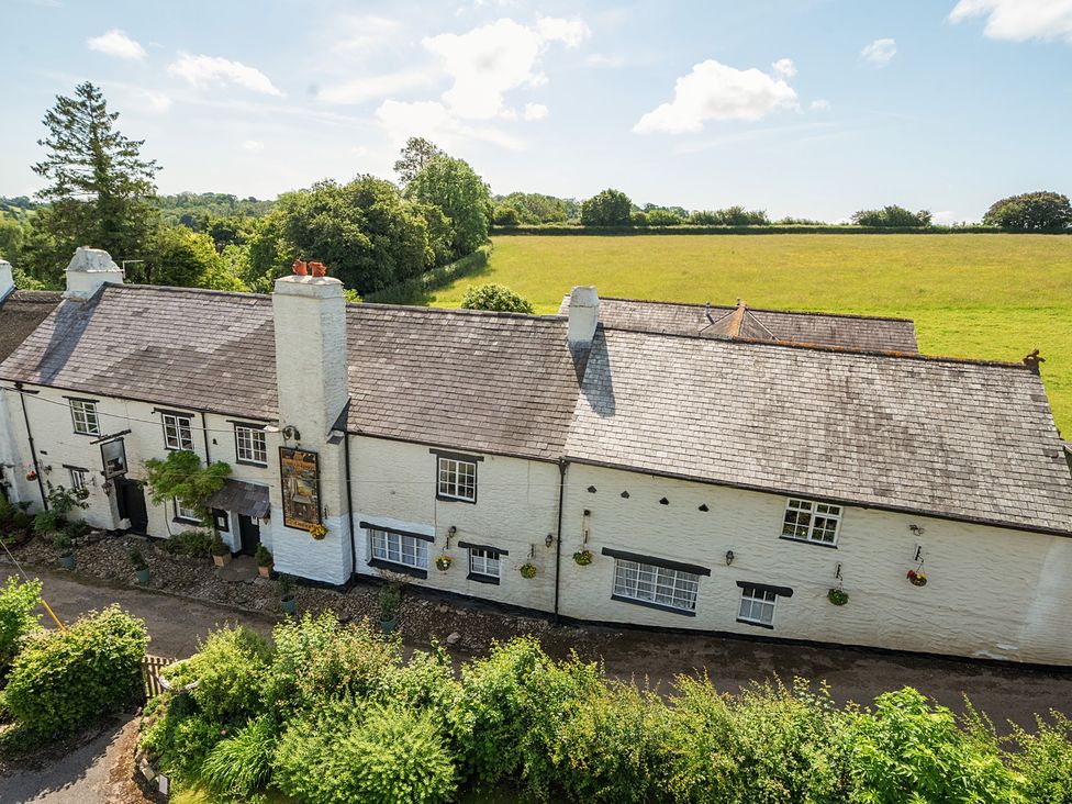 A house with a garden and fields at The Old Church House in Torbryan