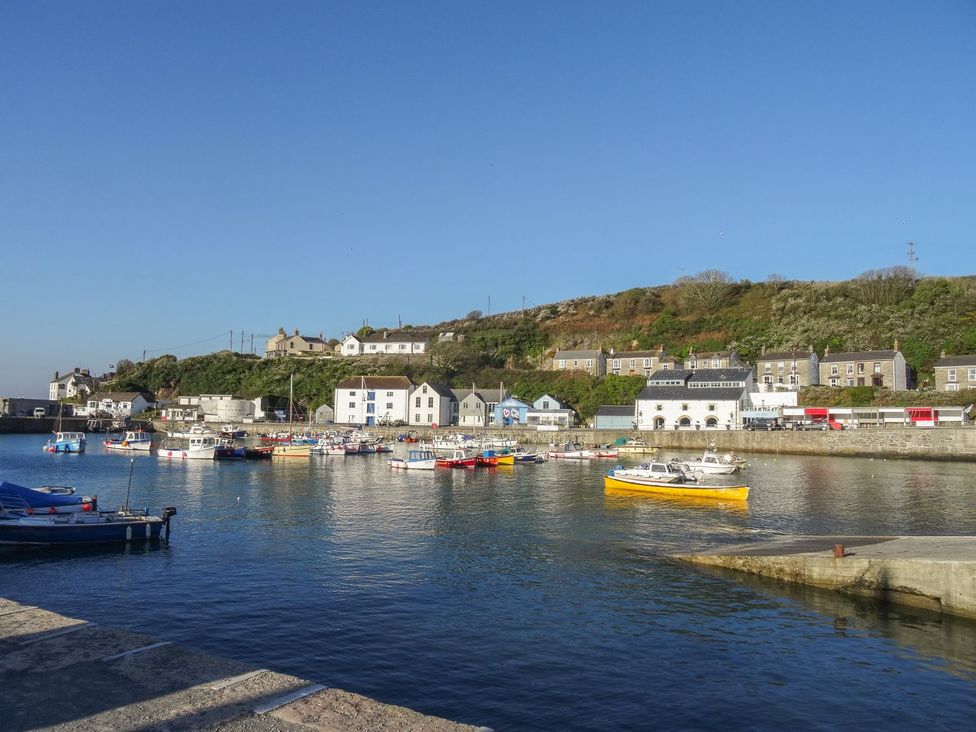 A harbor with boats and buildings at Kernyk Rinsey near Porthleven
