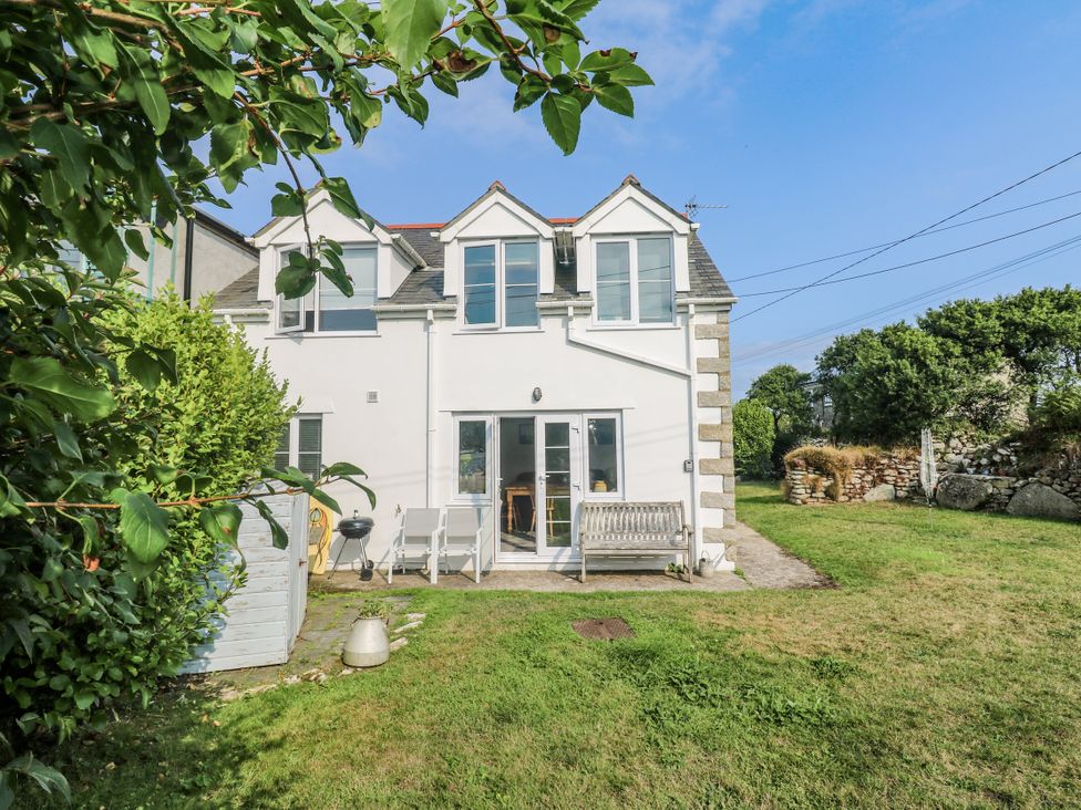 A house with a garden and outdoor seating at Kernyk in Rinsey near Porthleven