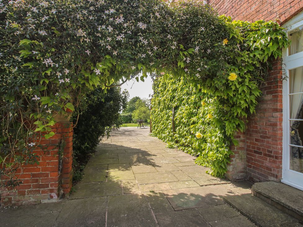 An archway covered with plants at Hilltop House in Tenbury Wells