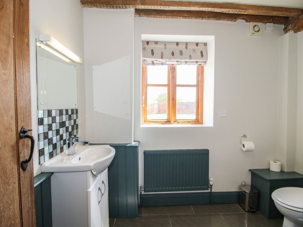 A bathroom with a sink and toilet at The Chestnuts in Tenbury Wells