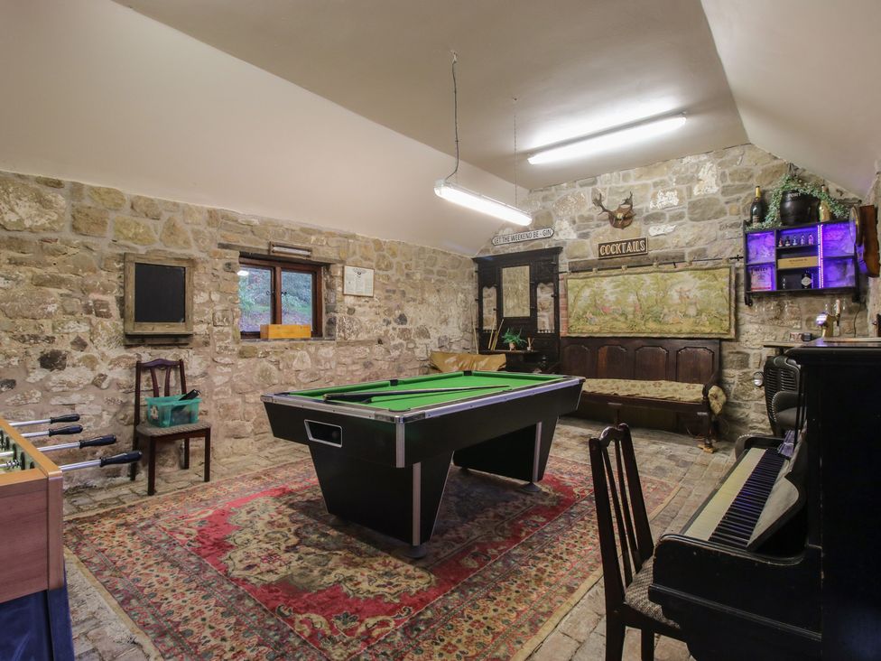 A games room with a pool table and piano at Corn House in Cardington