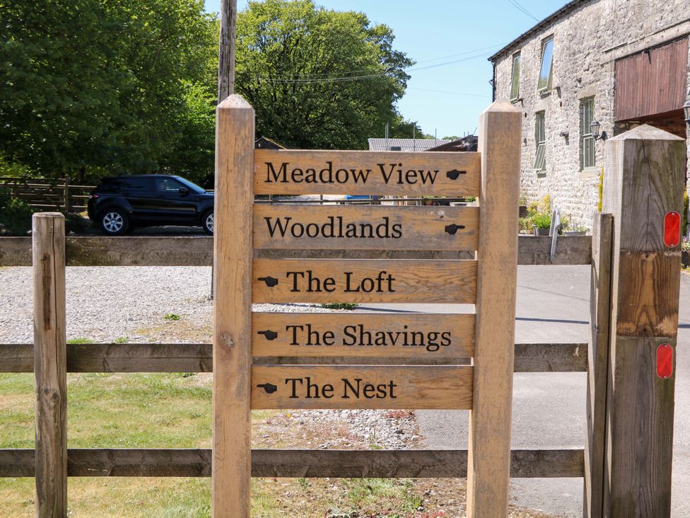 A directional sign at The Shavings in Cowdale near Buxton