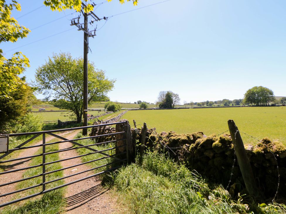 A path and gate leading to a field at The Shavings in Cowdale near Buxton