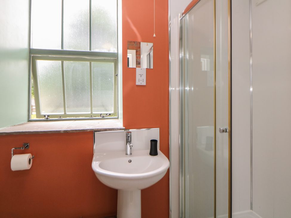 A bathroom with a sink and shower at Meadow View in Buxton