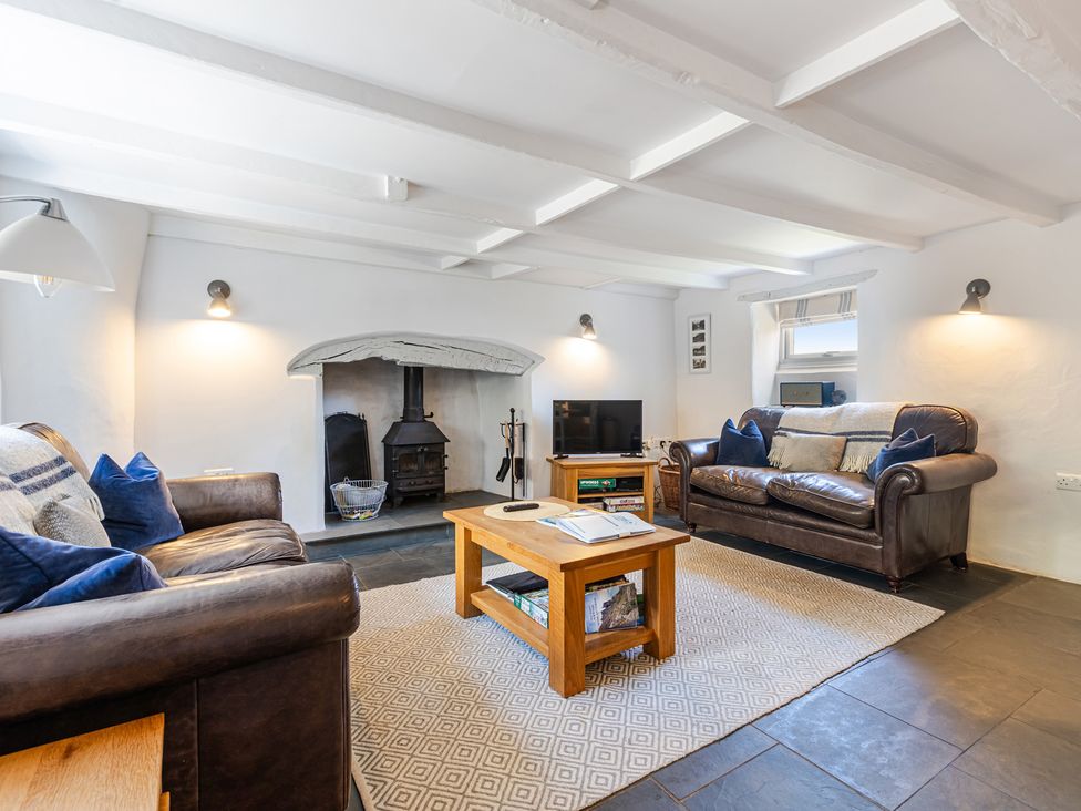 A living room with a coffee table and two sofas at 3 Glendale Cottages Dittisham near Dartmouth