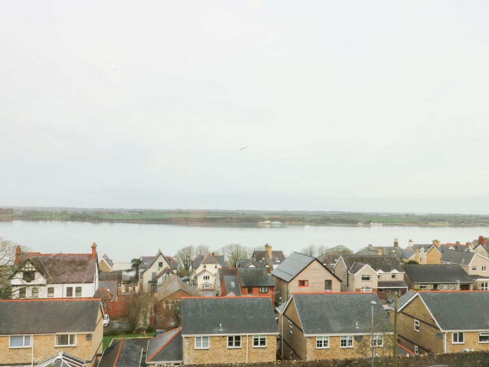 A view of houses by the water at Preswylfa in Caernarfon