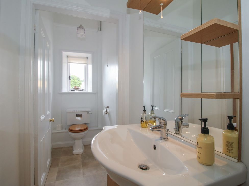 A bathroom with a sink and toilet at The Old Nursery in Bourton near Much Wenlock