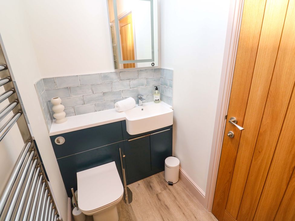 A bathroom with a sink and toilet at 21 Alverton Street in Penzance
