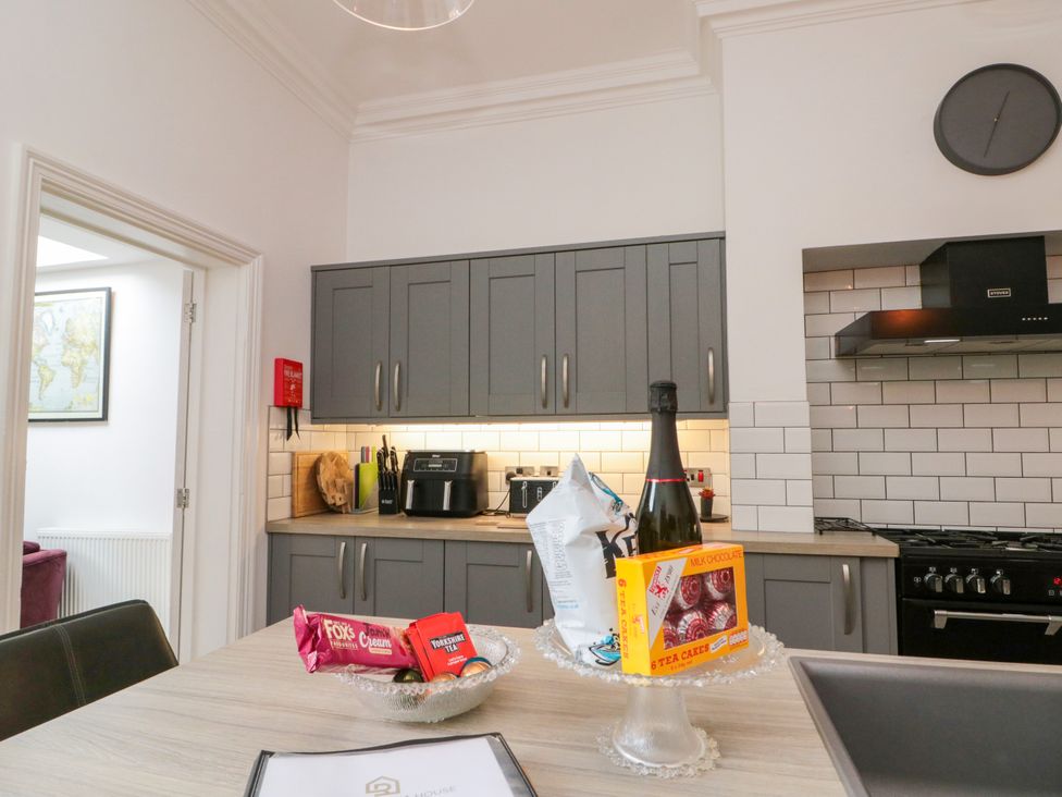 A kitchen with cabinets and a countertop at Royal Victoria House Scarborough