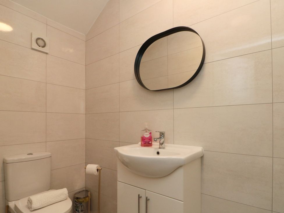 A bathroom with a sink and toilet at Royal Victoria House in Scarborough