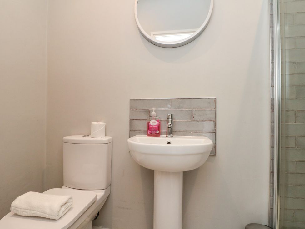 A bathroom with a sink and toilet at Royal Victoria House Scarborough