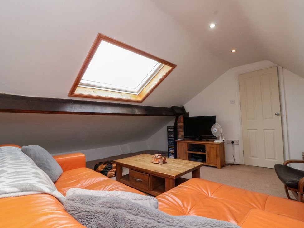 A loft with a sofa and coffee table at Royal Victoria House, Scarborough