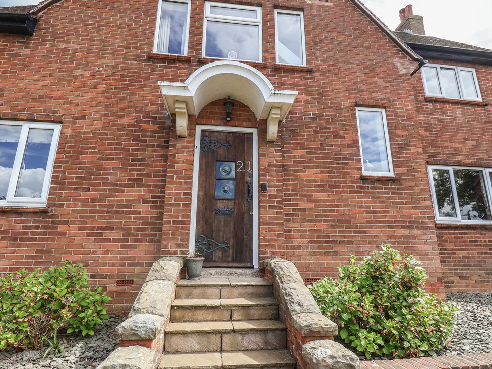 A front entrance with a door and windows at 21 Eskdaleside in Sleights