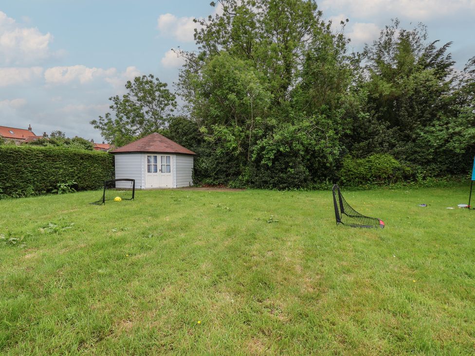 A garden with a shed and goalposts at 21 Eskdaleside Sleights