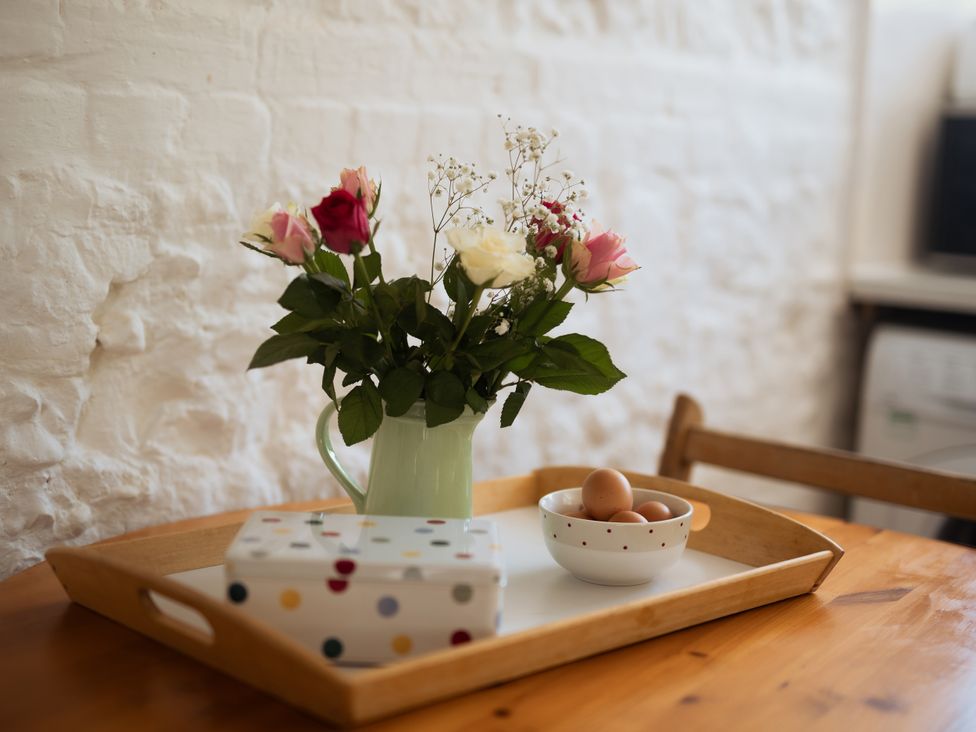 A tray with flowers and eggs at Newfield Farm Cottages in Pimperne near Blandford Forum