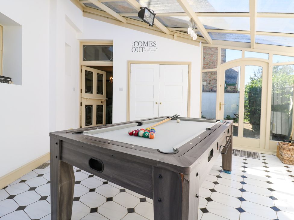 A pool table in a snug room at The Chestnuts in Peterborough