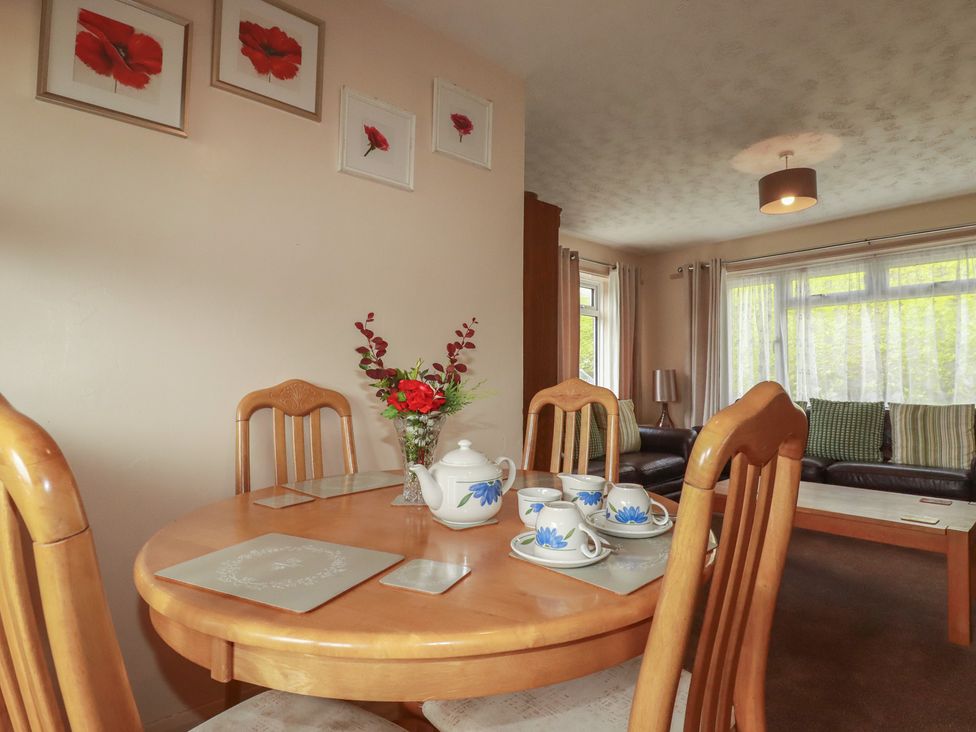 A dining room with a table set for tea at Underlanes in Boscastle