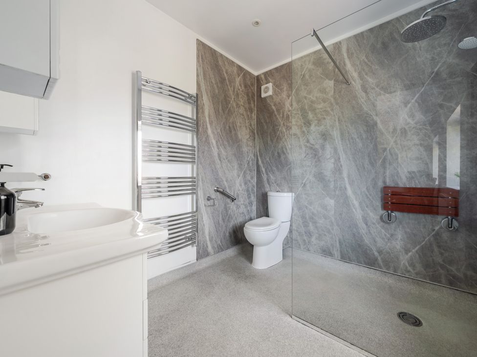 A bathroom with a sink and shower at Milton Manor in Milton On Stour