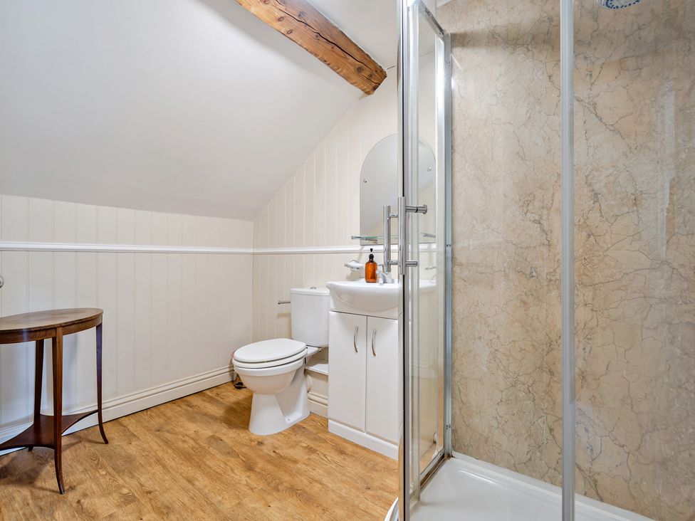 A bathroom with a sink and toilet at Milton Manor in Milton On Stour