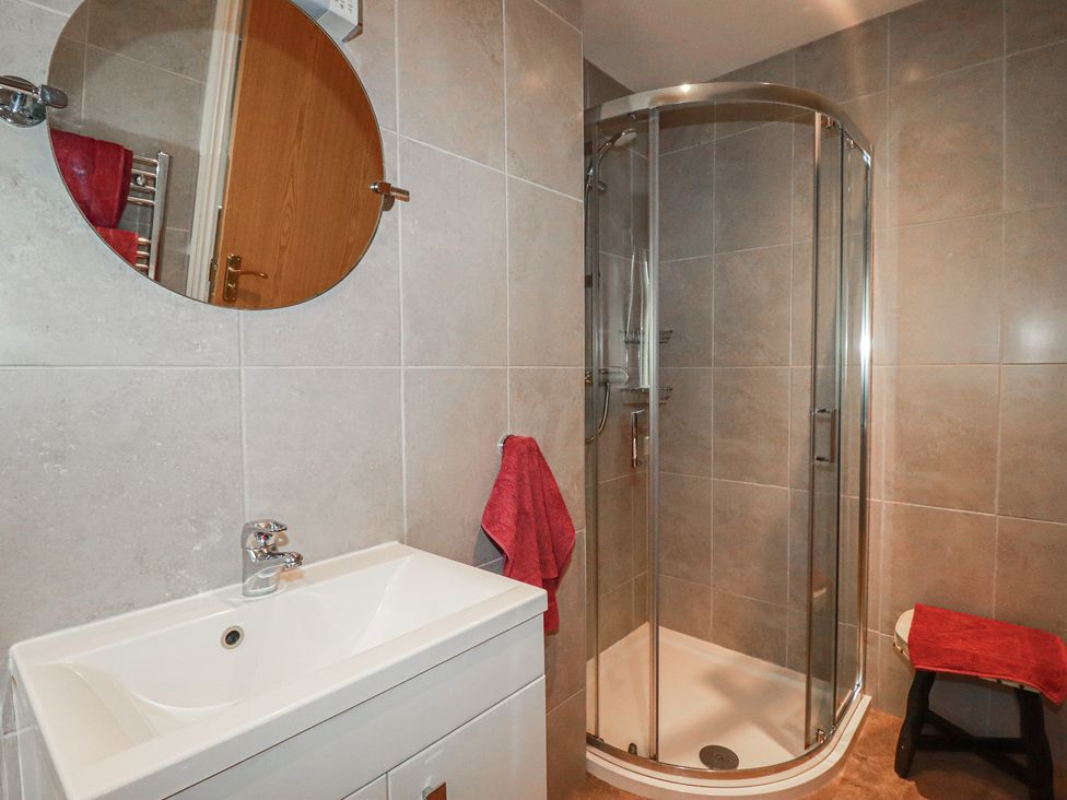 A bathroom with a sink and a shower at Little Lanes in Boscastle