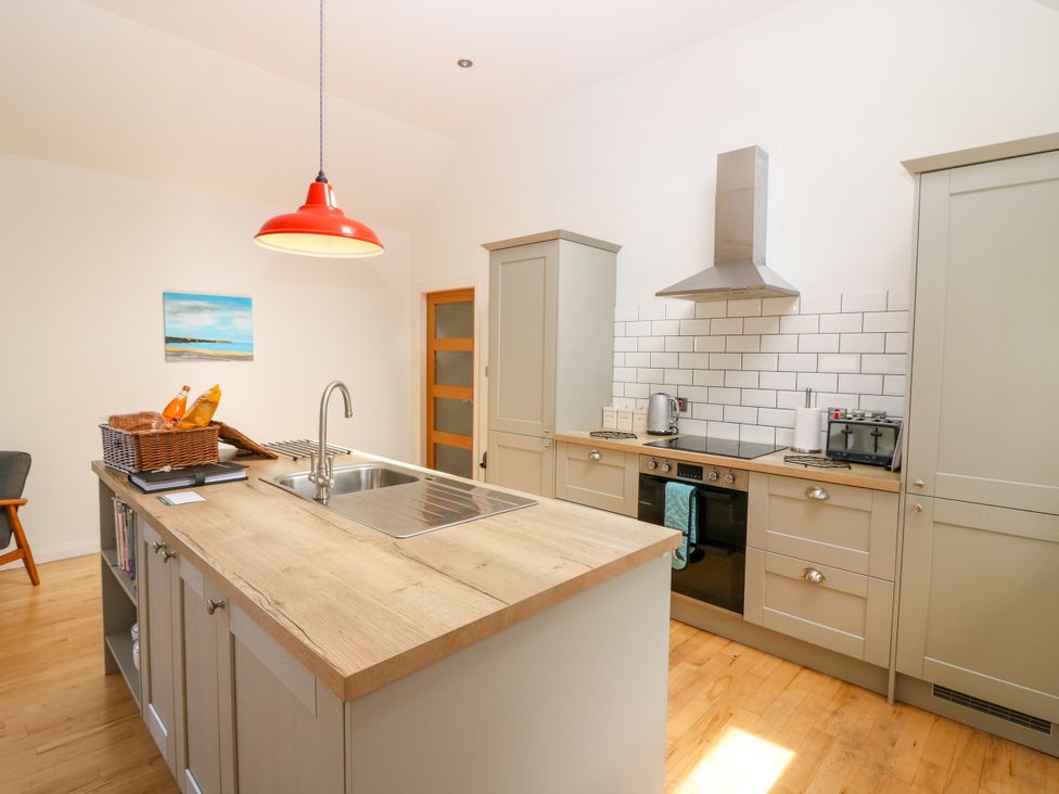A kitchen with a sink and stove at Whitehouse Woodwrae Aberlemno near Forfar