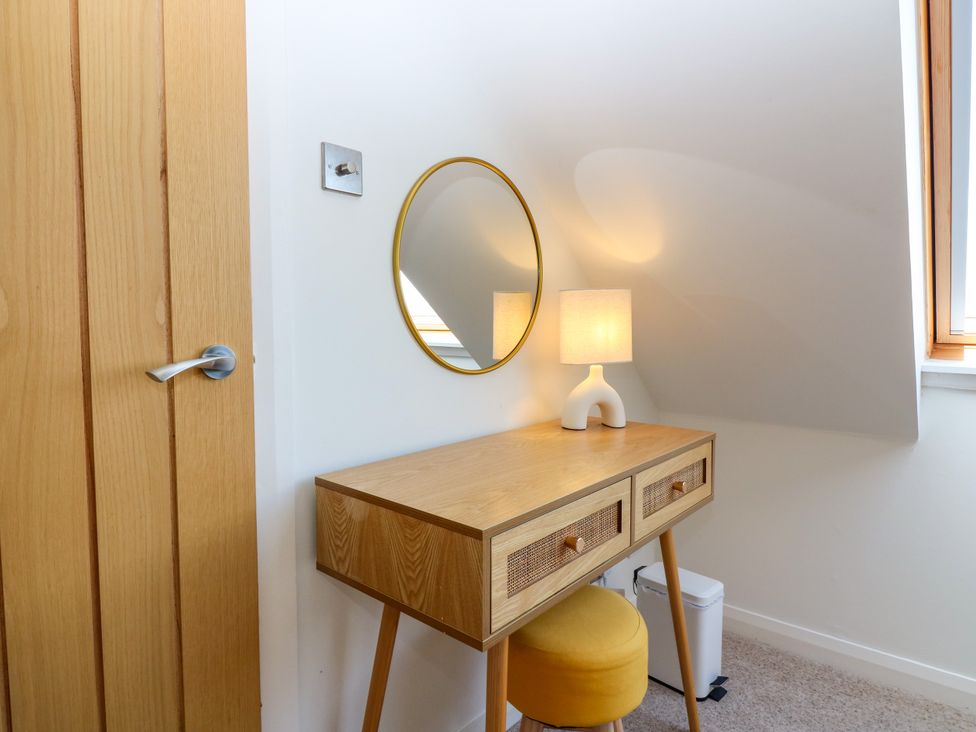An office with a desk and a lamp at Whitehouse Woodwrae Aberlemno near Forfar