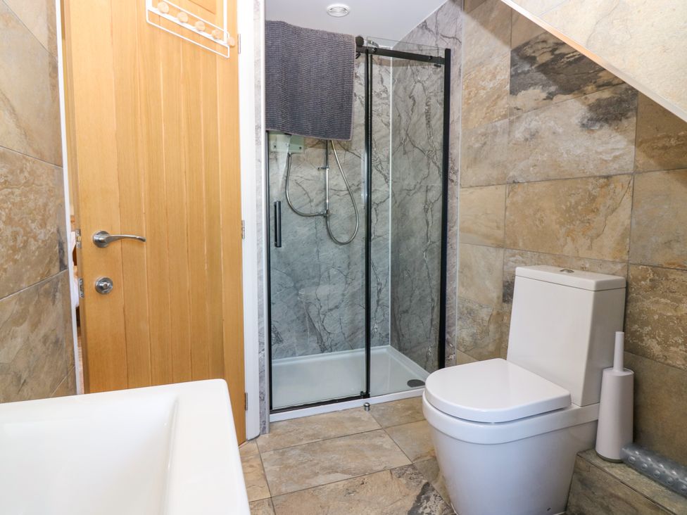 A bathroom with shower, toilet and sink at Whitehouse Woodwrae Aberlemno near Forfar
