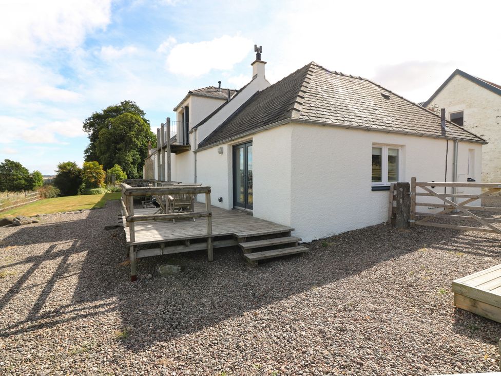 An exterior view of a house with a deck at Whitehouse Woodwrae Aberlemno near Forfar