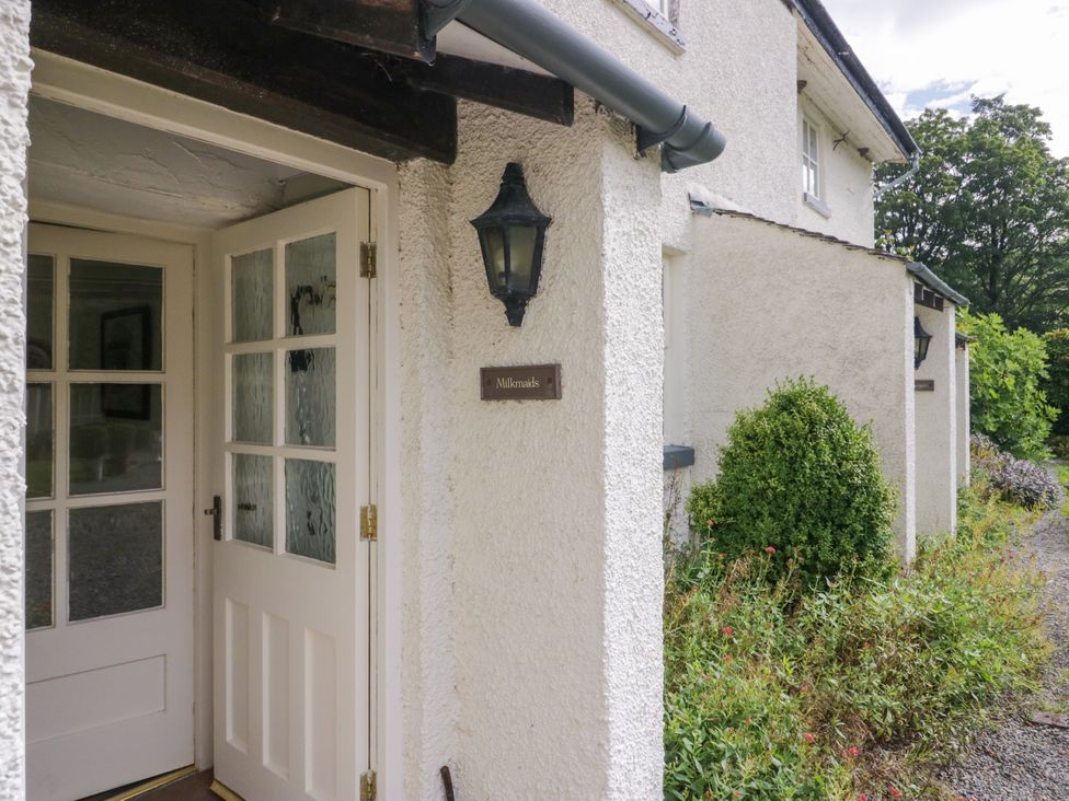An entrance area with a door and sign at Longlands Milkmaid's Parlour in Cartmel near Grange-over-Sands