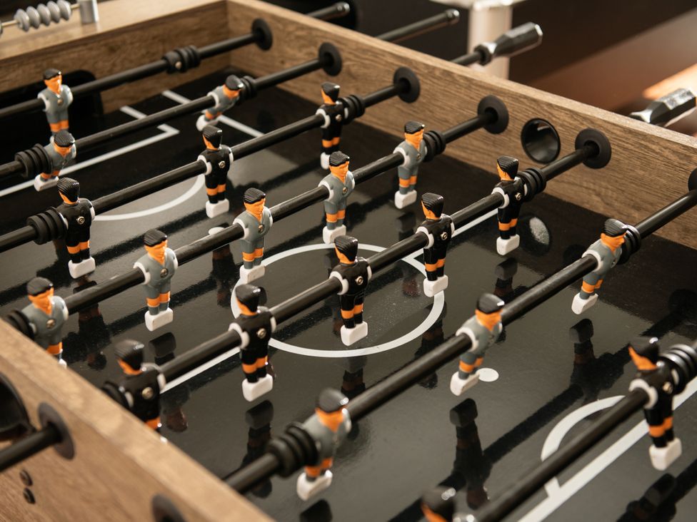 A foosball table with players at The Downwood in Blandford Forum