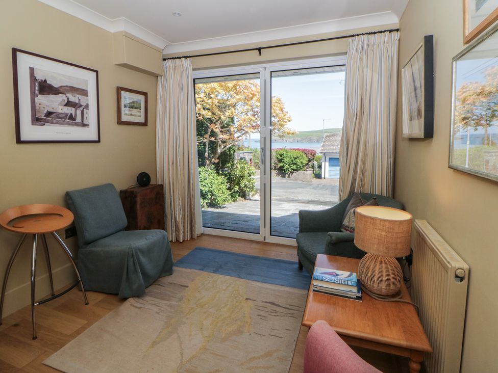 A snug with furniture and a view at Dolwylan in Newport, Pembrokeshire