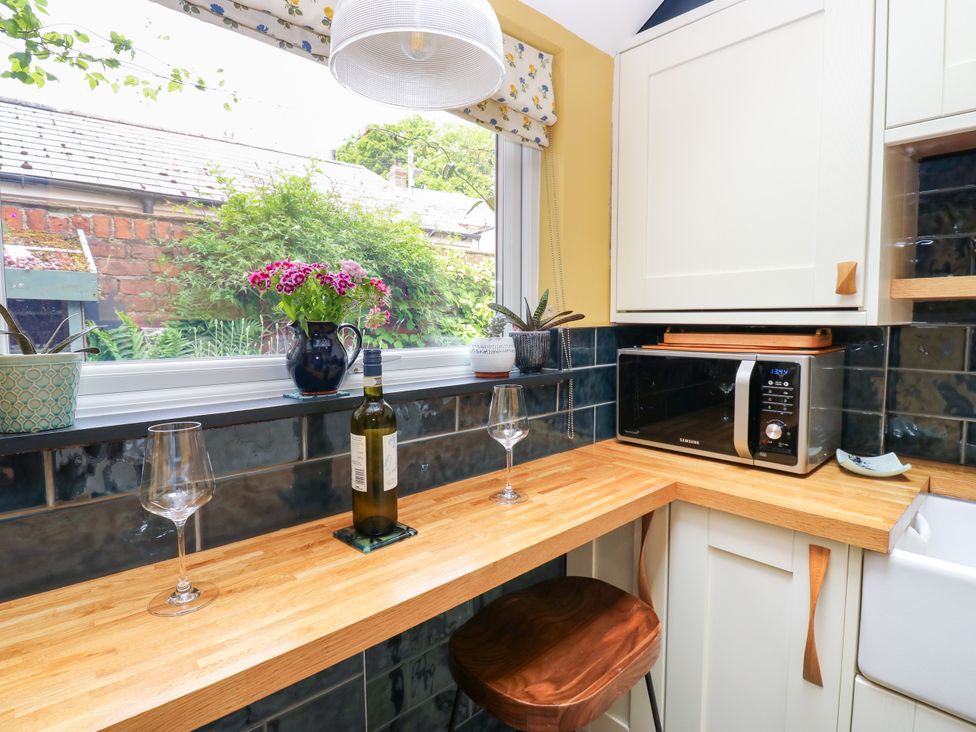 A kitchen with a window and countertop at 4 Ford Street Lanchester