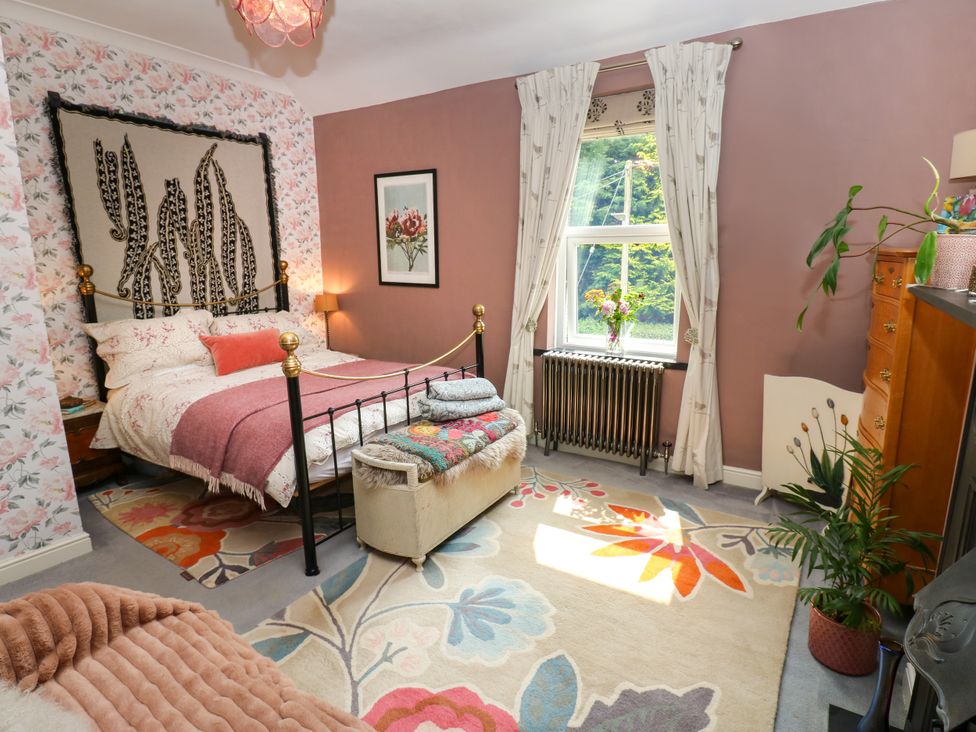 A bedroom with bed, window, and radiator at 4 Ford Street Lanchester