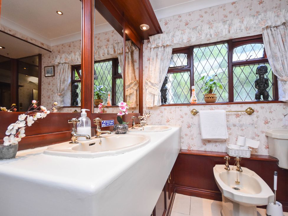 A bathroom with a sink and a toilet at Freshwinds in Market Drayton