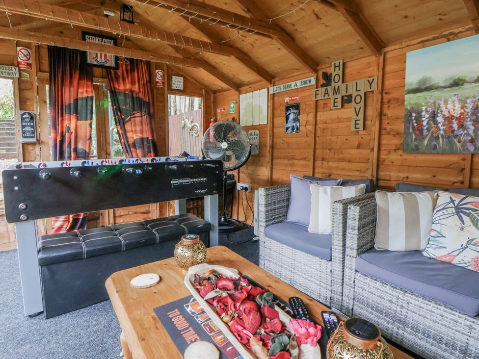 A snug with a foosball table and seating at Freshwinds in Market Drayton