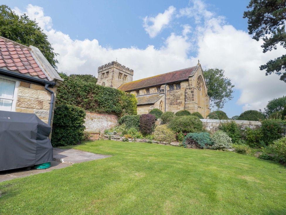A church and garden at Weavers Cottage in Carlton-in-Cleveland near Stokesley