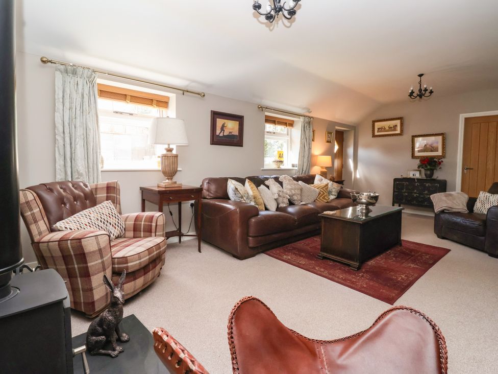 A living room with sofas and a coffee table at 1 Church Barns Pocklington